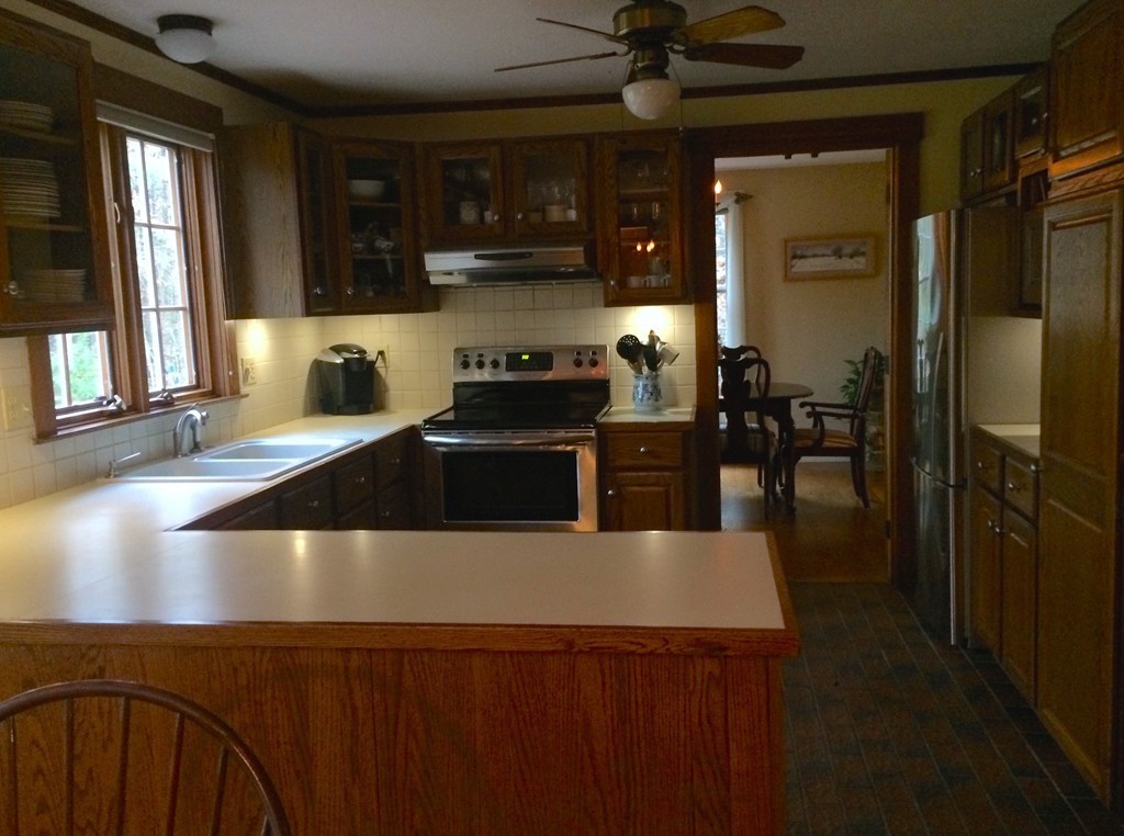 79 Strong Road Southampton, MA 01073 - Photo 6 of 30 a kitchen with stainless steel appliances granite countertop a sink a stove and a refrigerator