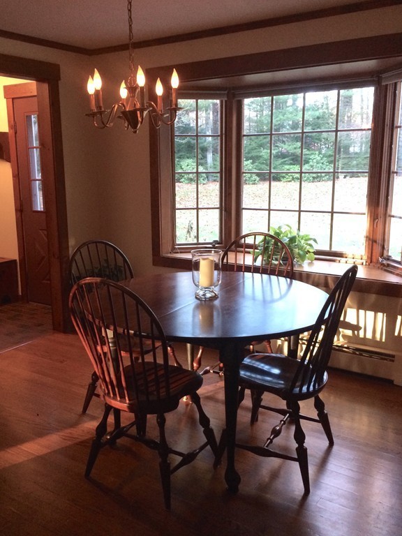 79 Strong Road Southampton, MA 01073 - Photo 7 of 30 a view of a dining room with furniture and wooden floor