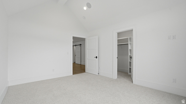 1682 North 1950 W Street, Unit 9 Provo, UT 84604 - Photo 65 of 84 Carpeted room with a vaulted ceiling, recessed lighting, and a built-in closet with shelving