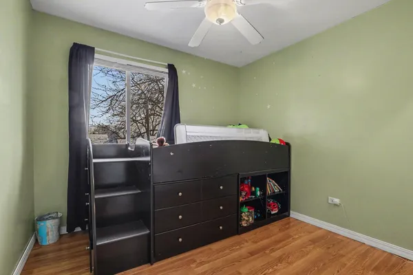 a room with a walk in closet and a window