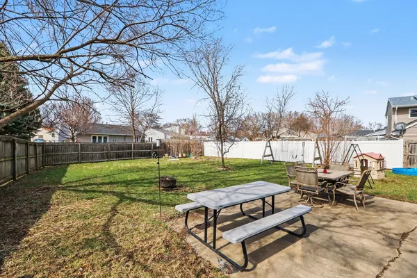 a view of a bench in a park