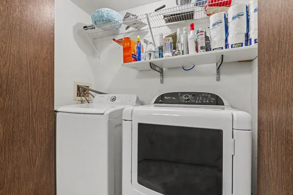 a utility room with dryer and washer