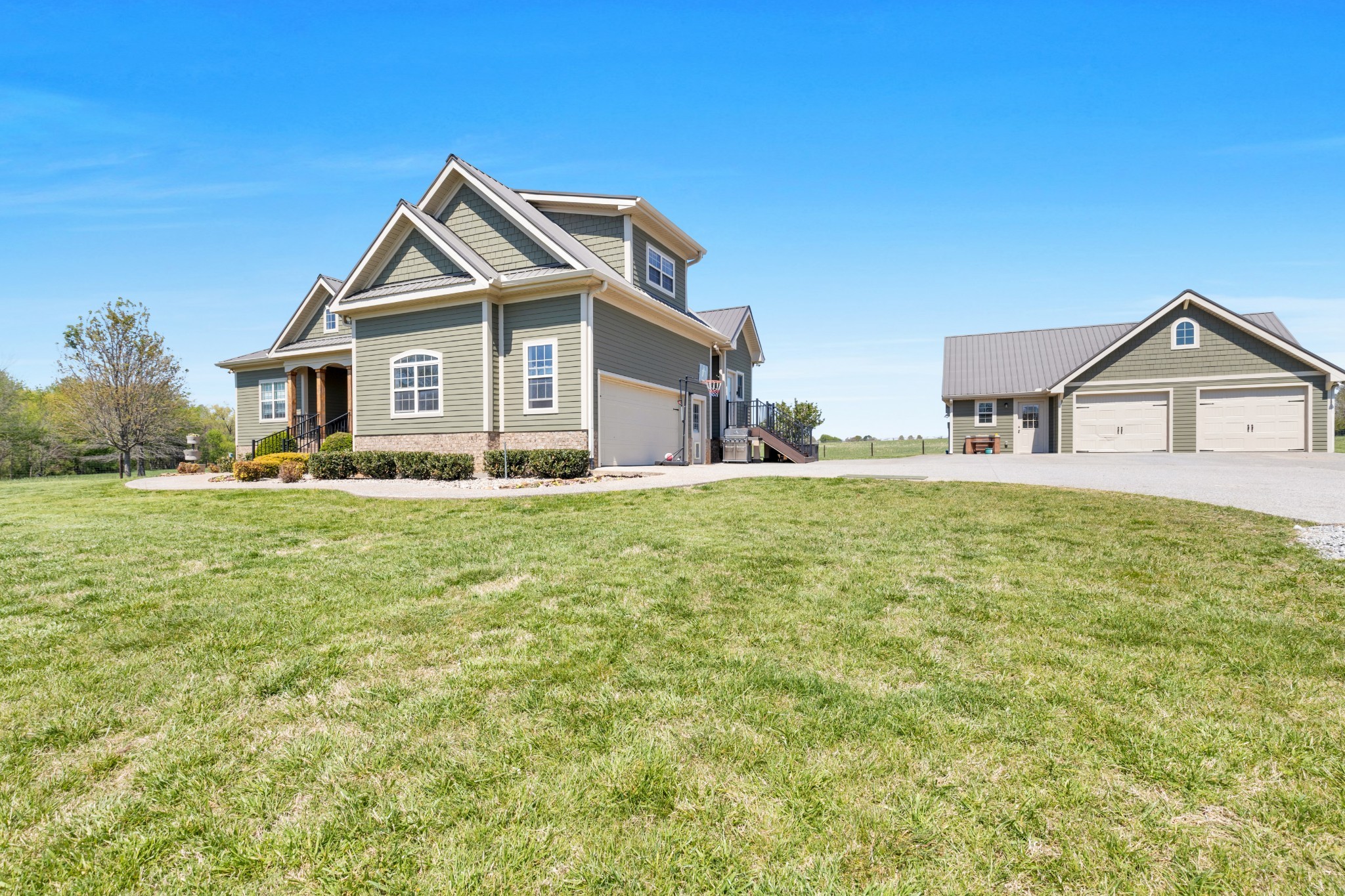 3988 Fykes Grove Road Cedar Hill, TN 37032 - Photo 2 of 50 a front view of a house with a yard