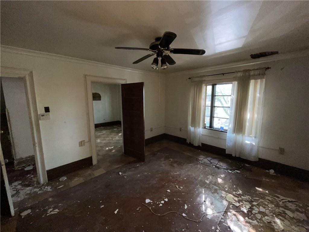 1013 4th Street Braddock, PA 15104 - Photo 11 of 16 wooden floor in an empty room with a window