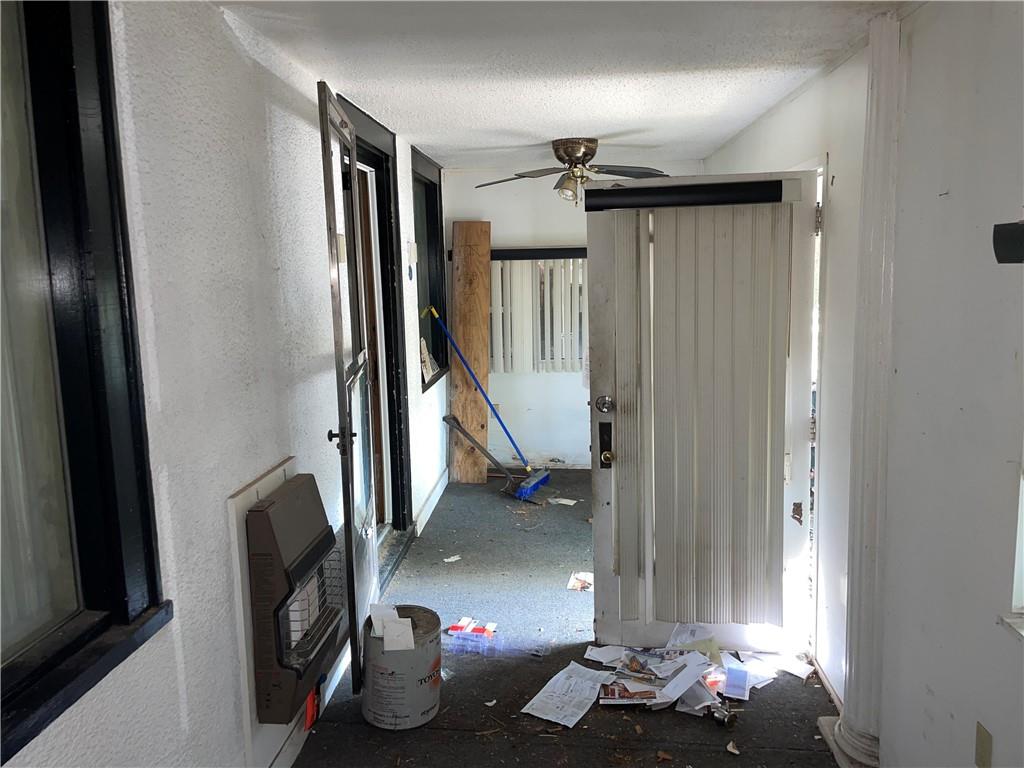 1013 4th Street Braddock, PA 15104 - Photo 3 of 16 a view of living room with furniture and a window