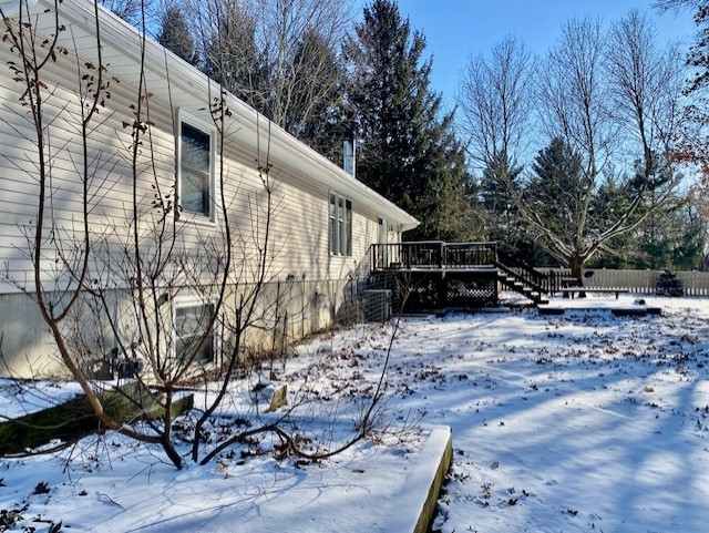 2280 Timber Ridge Drive Princeton, IL 61356 - Photo 15 of 20 a view of backyard with potted plants and a large tree