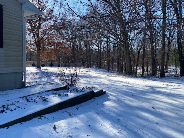 2280 Timber Ridge Drive Princeton, IL 61356 - Photo 19 of 20 a view of a yard with wooden fence