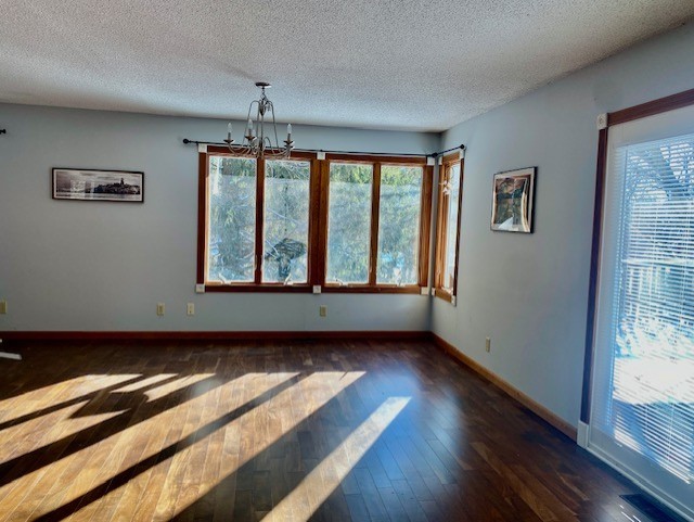 2280 Timber Ridge Drive Princeton, IL 61356 - Photo 6 of 20 a view of an empty room with wooden floor and a window
