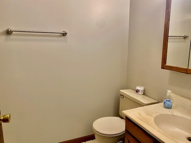 2280 Timber Ridge Drive Princeton, IL 61356 - Photo 8 of 20 a white toilet sitting next to a bathroom sink