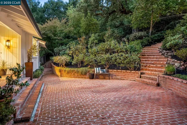 a backyard of a house with lots of green space