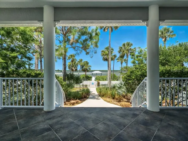 a bedroom with furniture and wooden floor