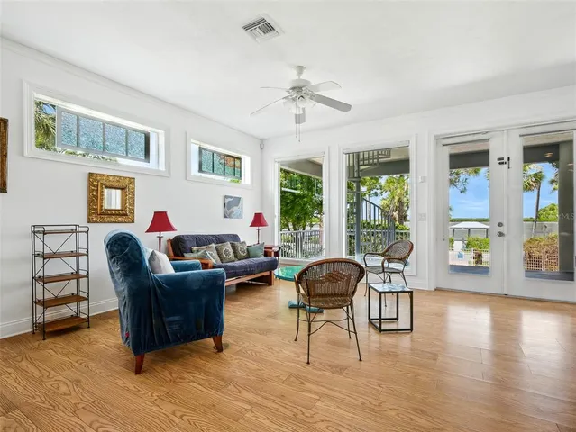 a bathroom with a granite countertop sink mirror and toilet