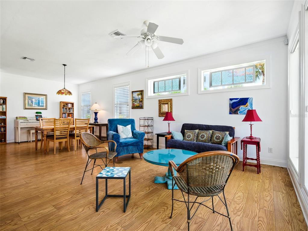 206 South Riverside Drive Edgewater, FL 32132 - Photo 16 of 60 a living room with furniture and wooden floor