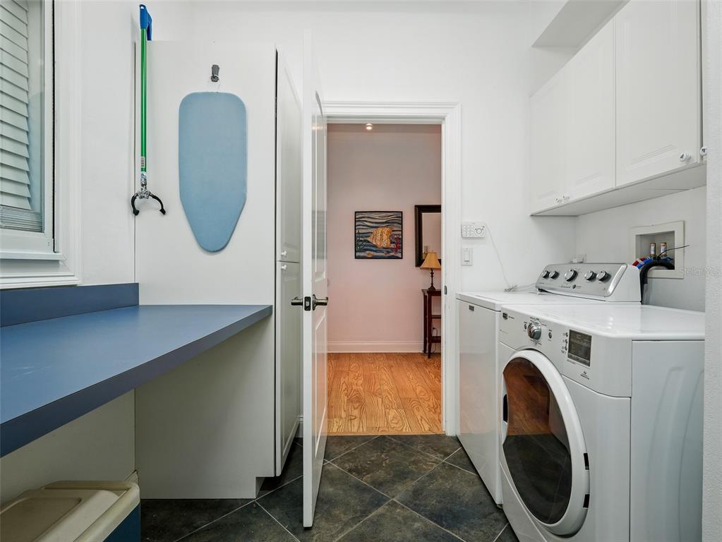 206 South Riverside Drive Edgewater, FL 32132 - Photo 28 of 60 a utility room with sink dryer and washer