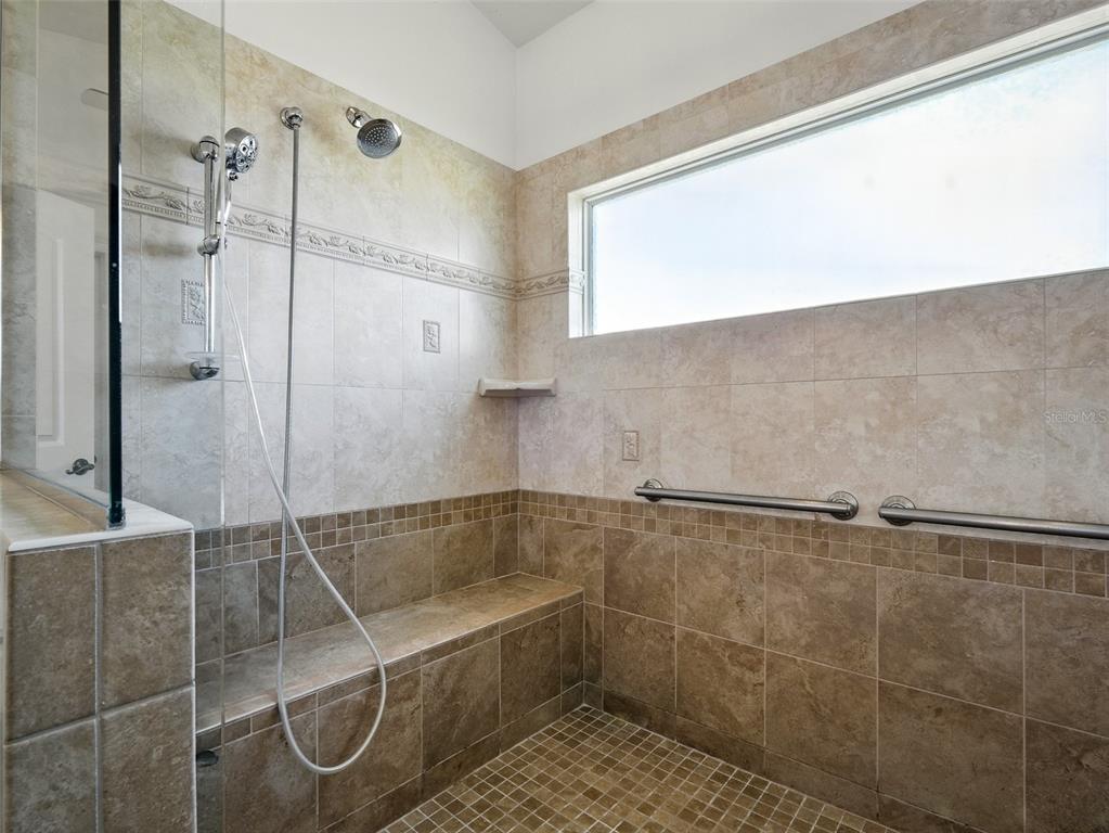 206 South Riverside Drive Edgewater, FL 32132 - Photo 42 of 60 a bathroom with a shower