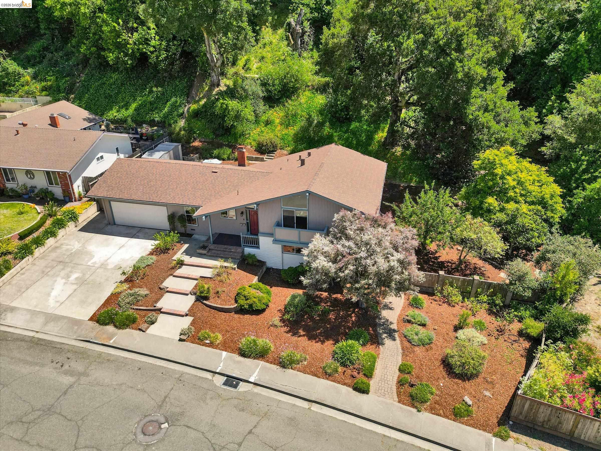 2826 Wright Avenue Pinole, CA 94564 - Photo 56 of 70 Mid-century modern residence featuring a brown shingle roof and an attached two-car garage