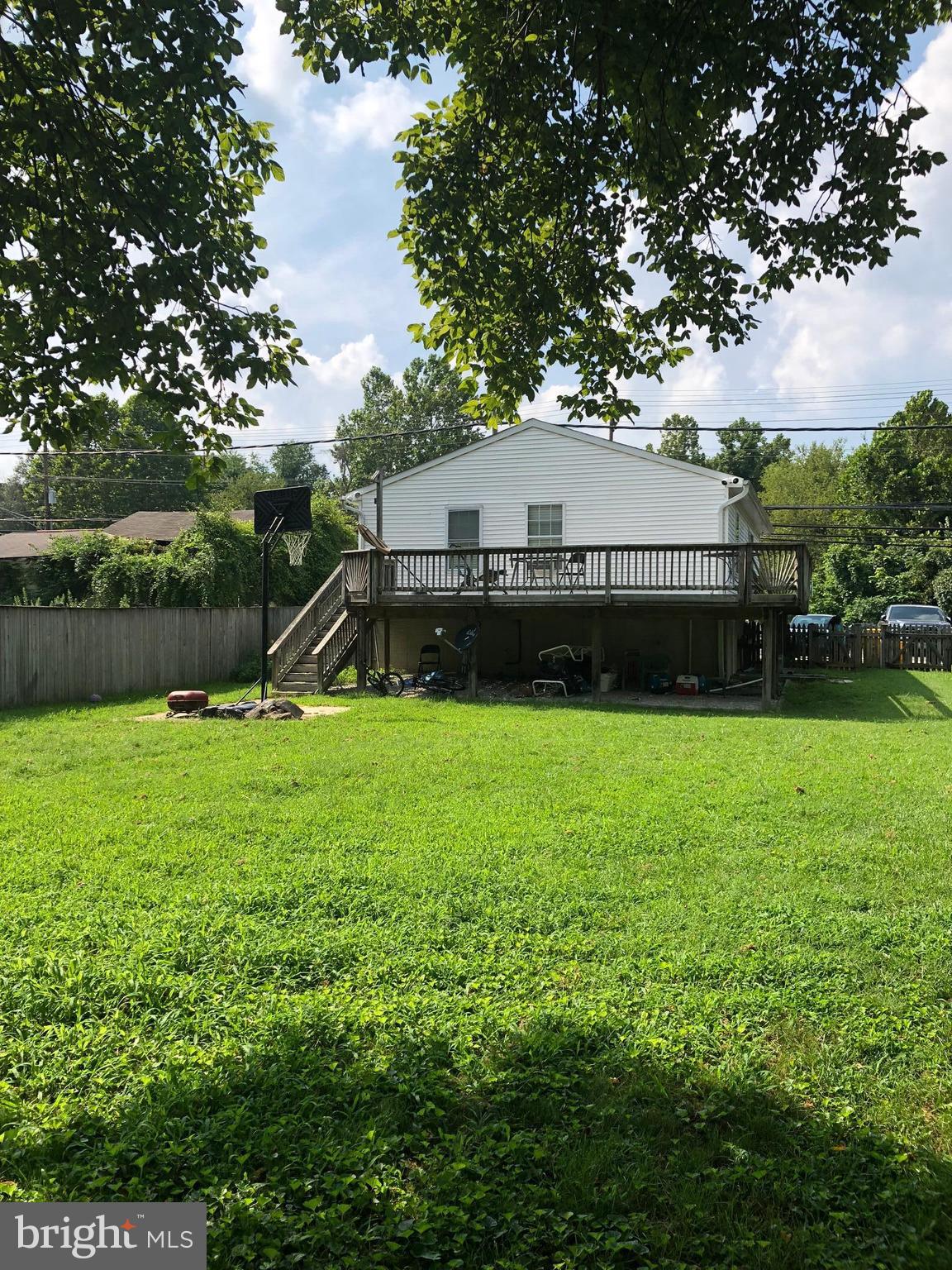 8121 Hog Neck Road Pasadena, MD 21122 - Photo 6 of 8 a view of a backyard with a garden