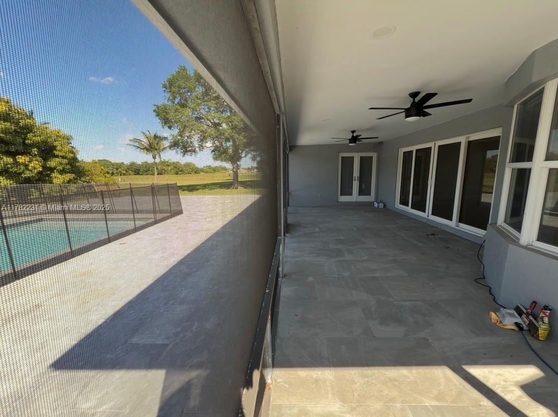 16911 Southwest 66th Street Southwest Ranches, FL 33331 - Photo 30 of 70 a view of balcony with furniture