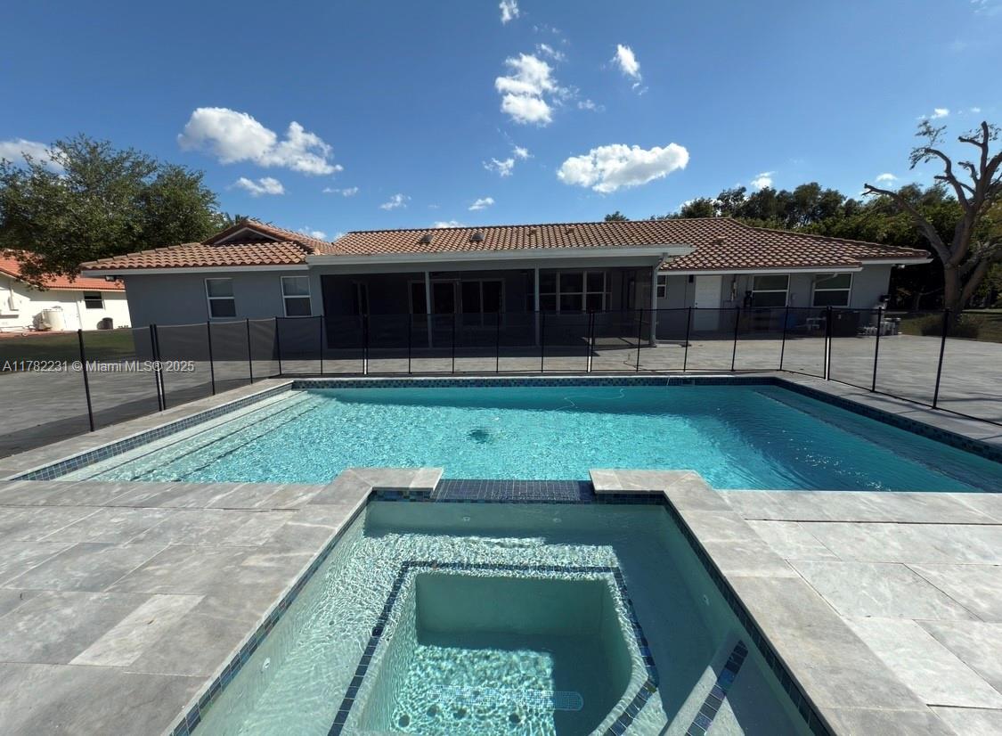 16911 Southwest 66th Street Southwest Ranches, FL 33331 - Photo 34 of 70 a view of a house with a backyard