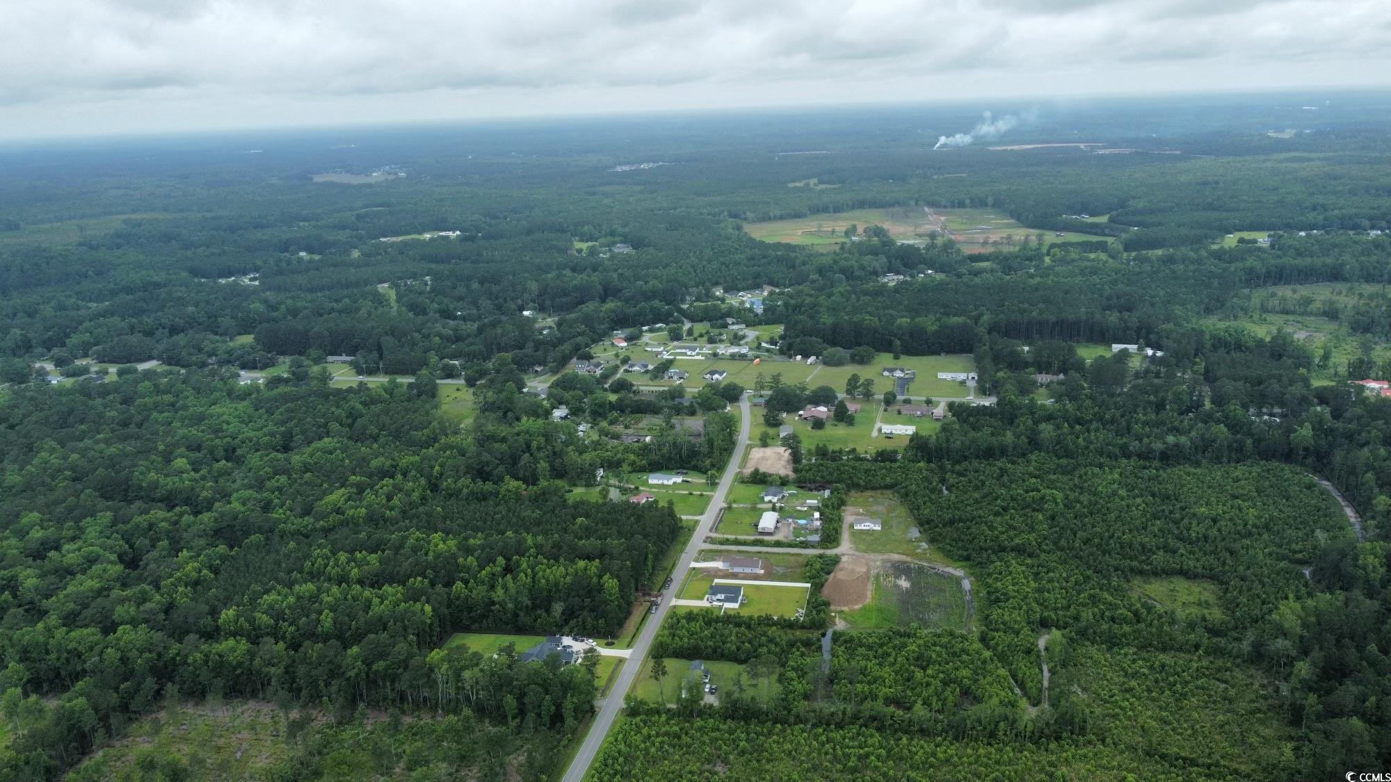 22.66 Berley Mc Road Conway, SC 29526 - Photo 7 of 7 Aerial overview of property's location with a heavily wooded area