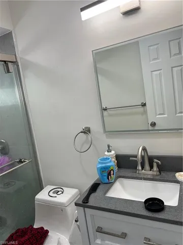 a bathroom with a sink and a toilet