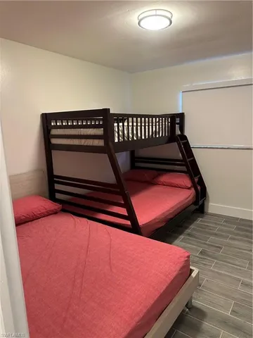 a bedroom with bunk bed
