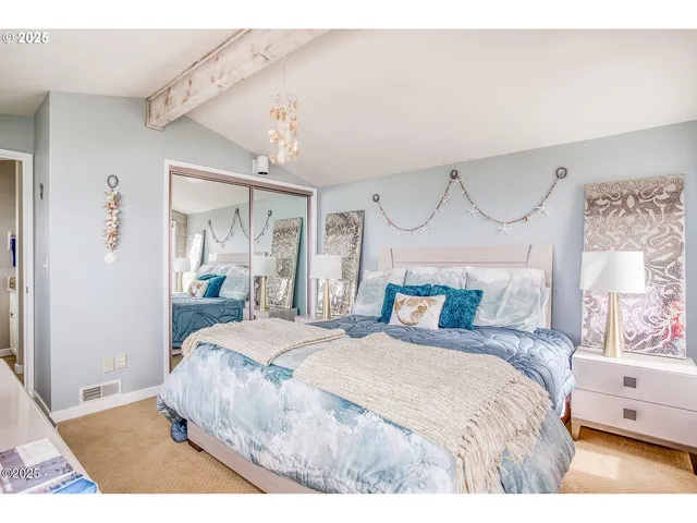 a view of a bathroom with sink and mirror