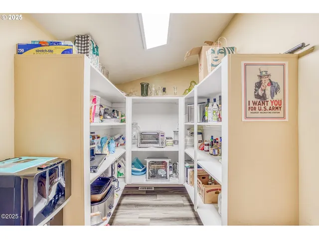 a view of balcony with wooden floor and outdoor seating