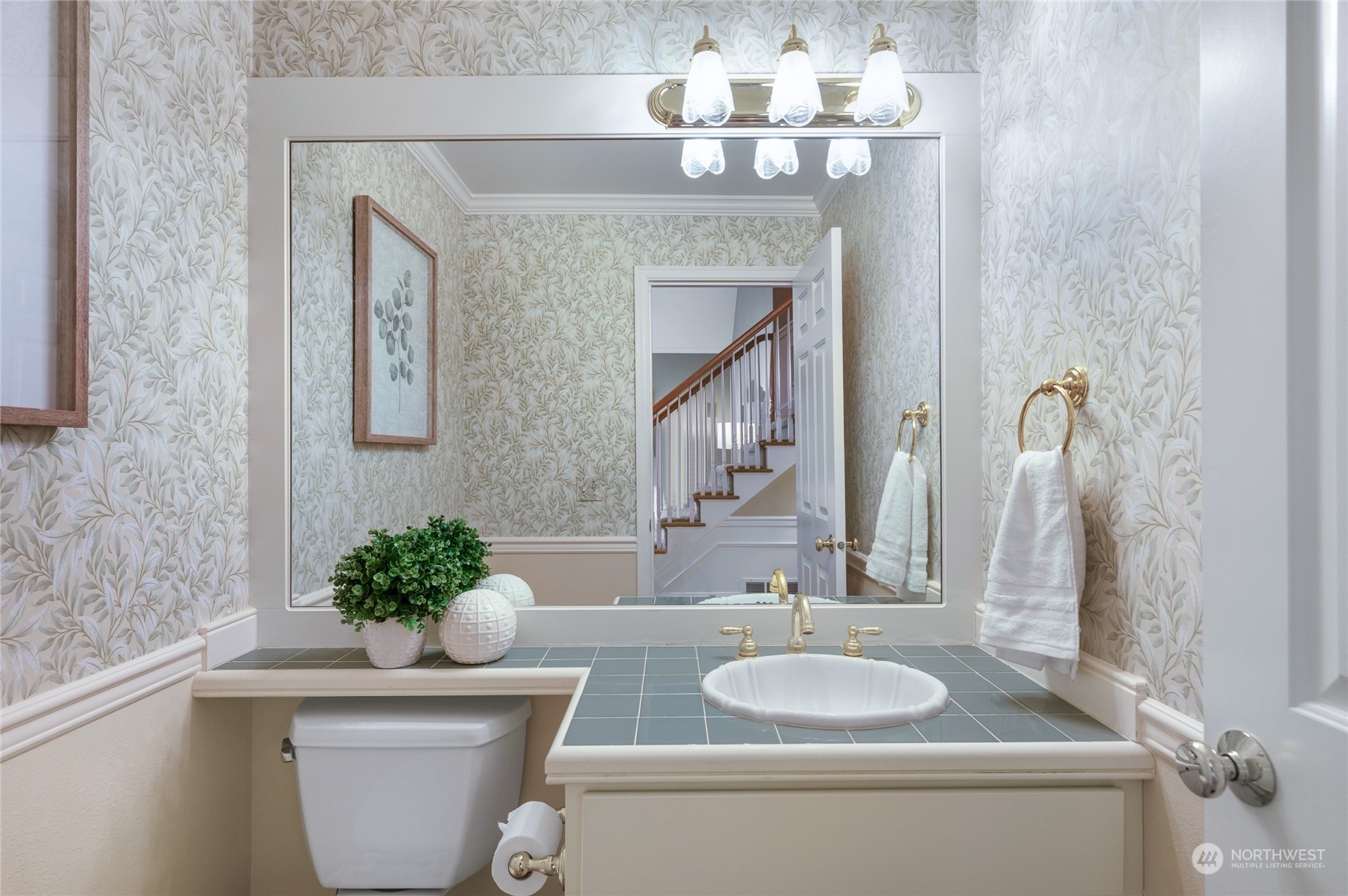 3019 213th Street Southeast Bothell, WA 98021 - Photo 18 of 32 a bathroom with a toilet sink and mirror
