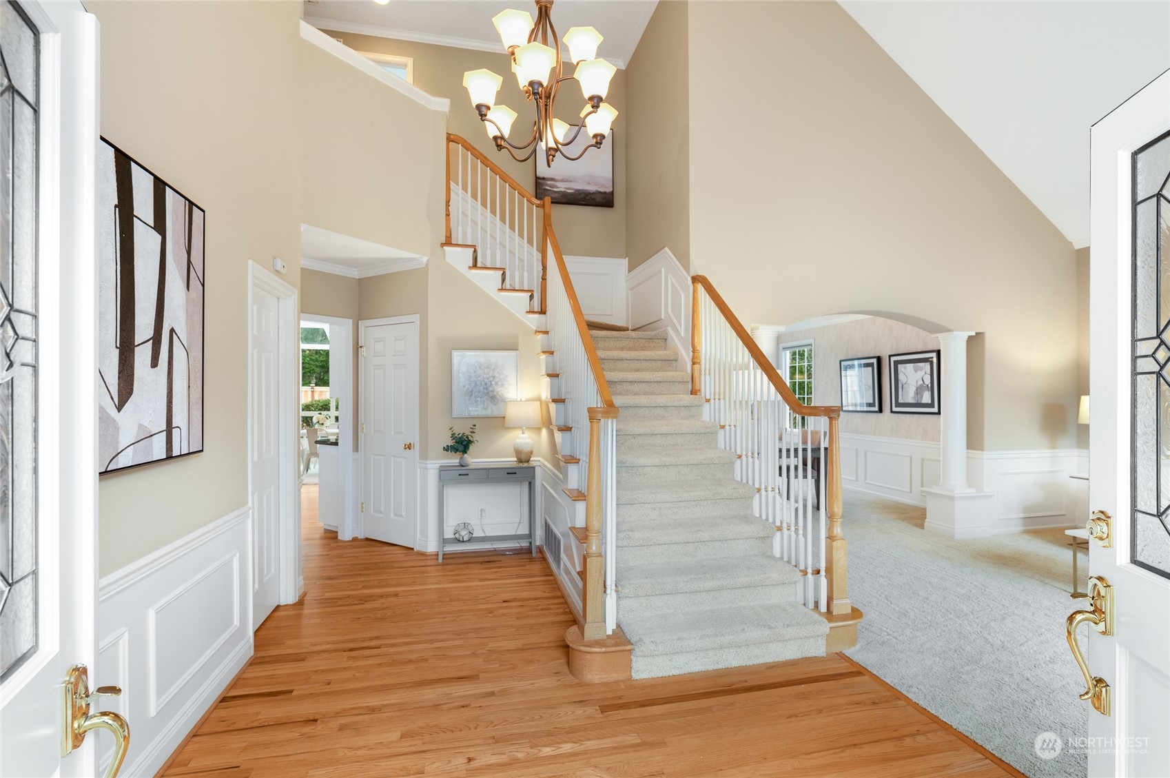 3019 213th Street Southeast Bothell, WA 98021 - Photo 3 of 32 a view of entryway and hall with wooden floor