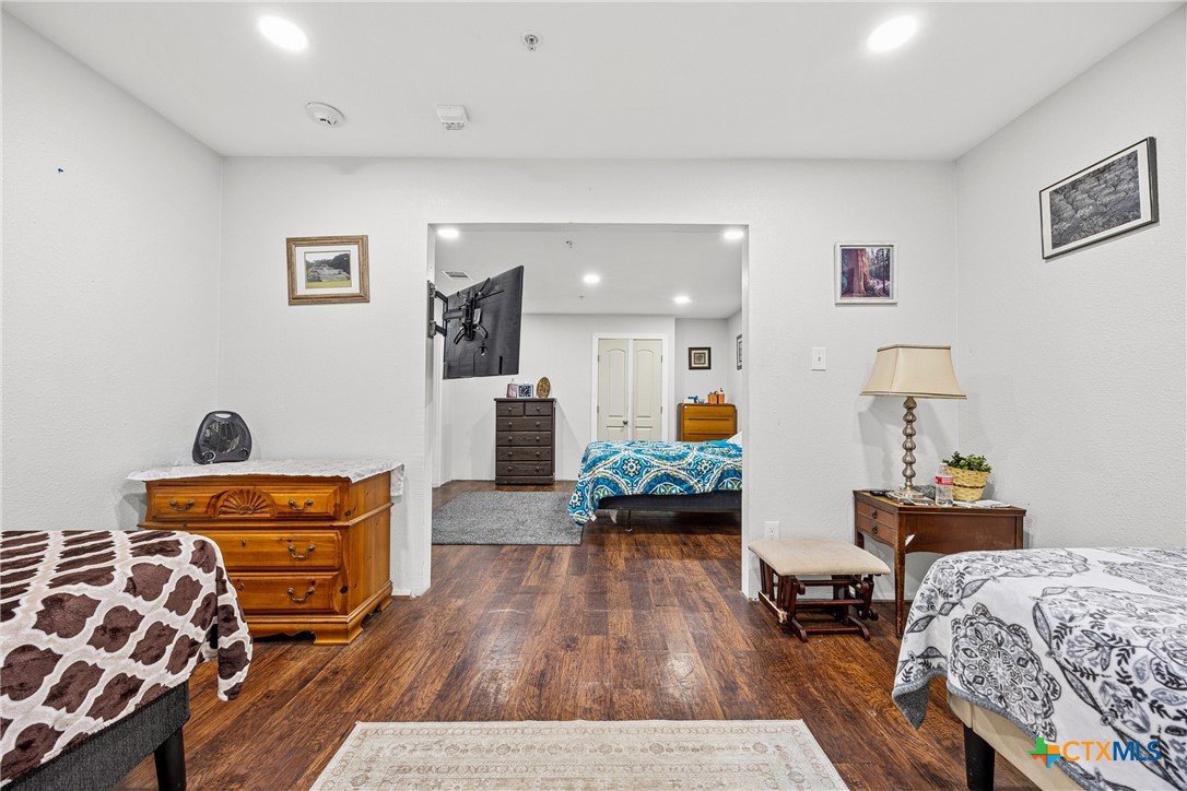15309 Delahunty Lane Pflugerville, TX 78660 - Photo 13 of 35 a living room with furniture and wooden floor
