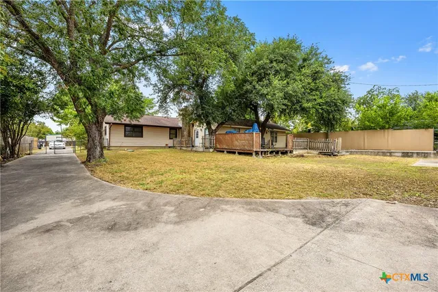 a view of pool with tree s