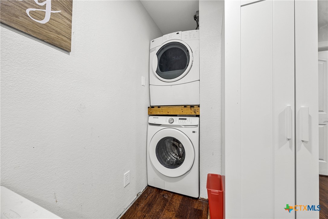 15309 Delahunty Lane Pflugerville, TX 78660 - Photo 32 of 35 a utility room with dryer and washer