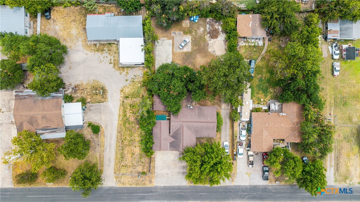 15309 Delahunty Lane Pflugerville, TX 78660 - Photo 35 of 35 an aerial view of residential houses with outdoor space and trees all around