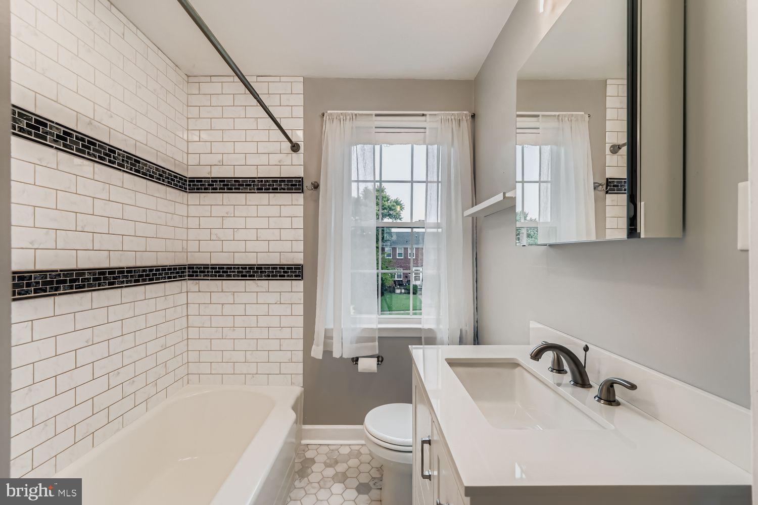 8119 Kirkwall Court Towson, MD 21286 - Photo 18 of 39 a bathroom with a sink and a bathtub