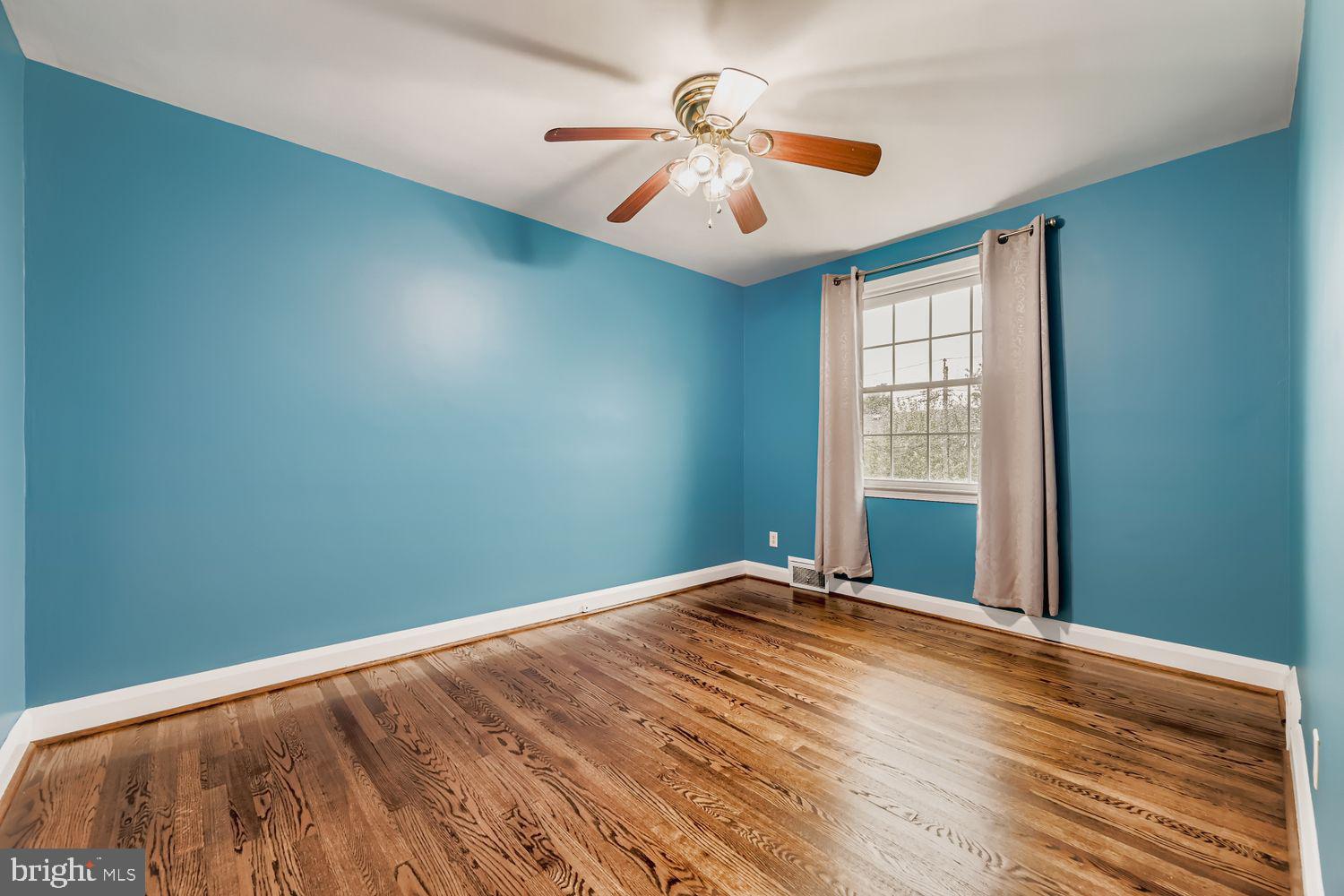 8119 Kirkwall Court Towson, MD 21286 - Photo 21 of 39 wooden floor in a room with a window