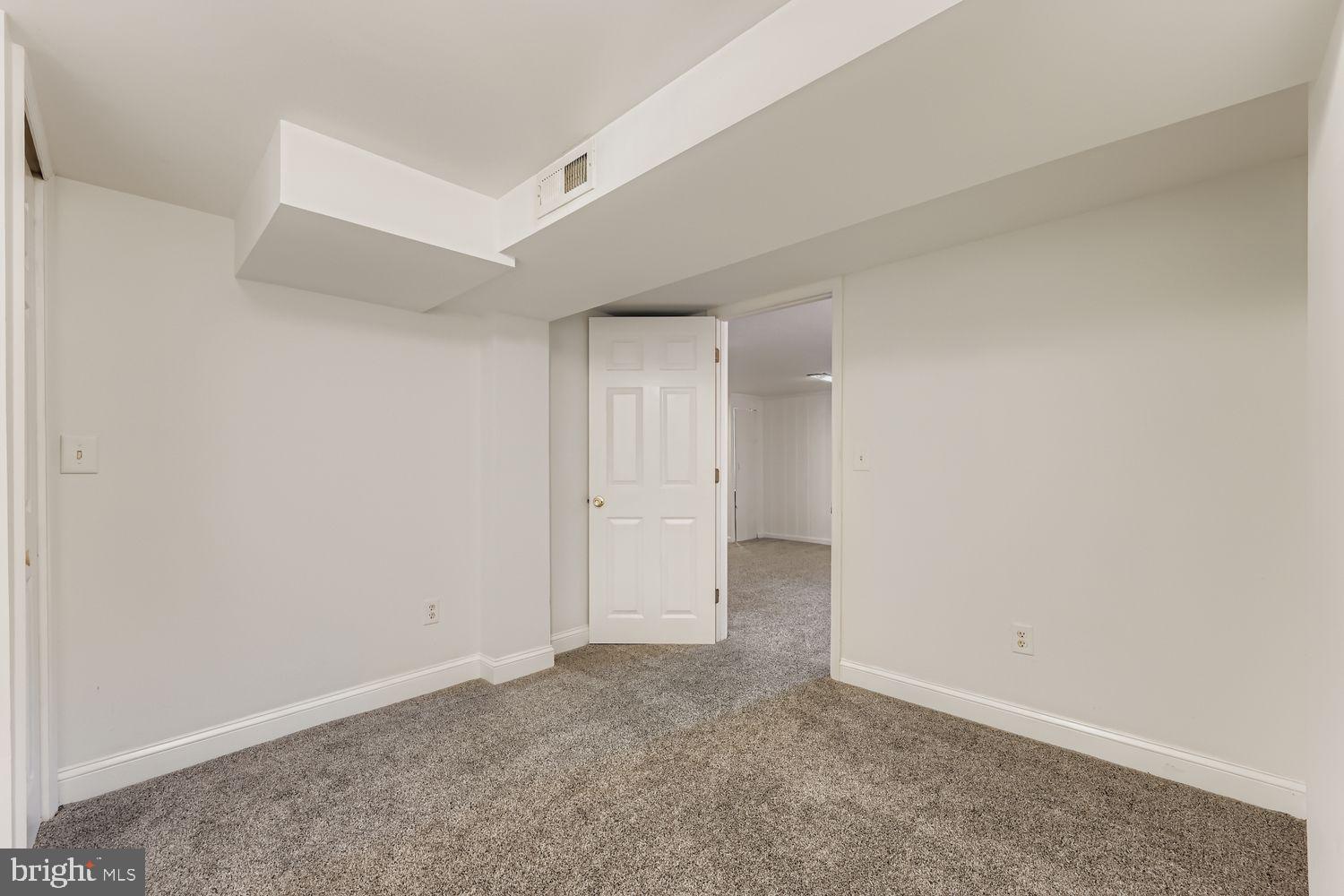8119 Kirkwall Court Towson, MD 21286 - Photo 26 of 39 a view of an empty room