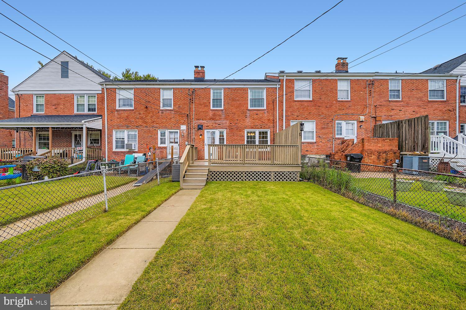 8119 Kirkwall Court Towson, MD 21286 - Photo 35 of 39 a view of a big building with a big yard and plants