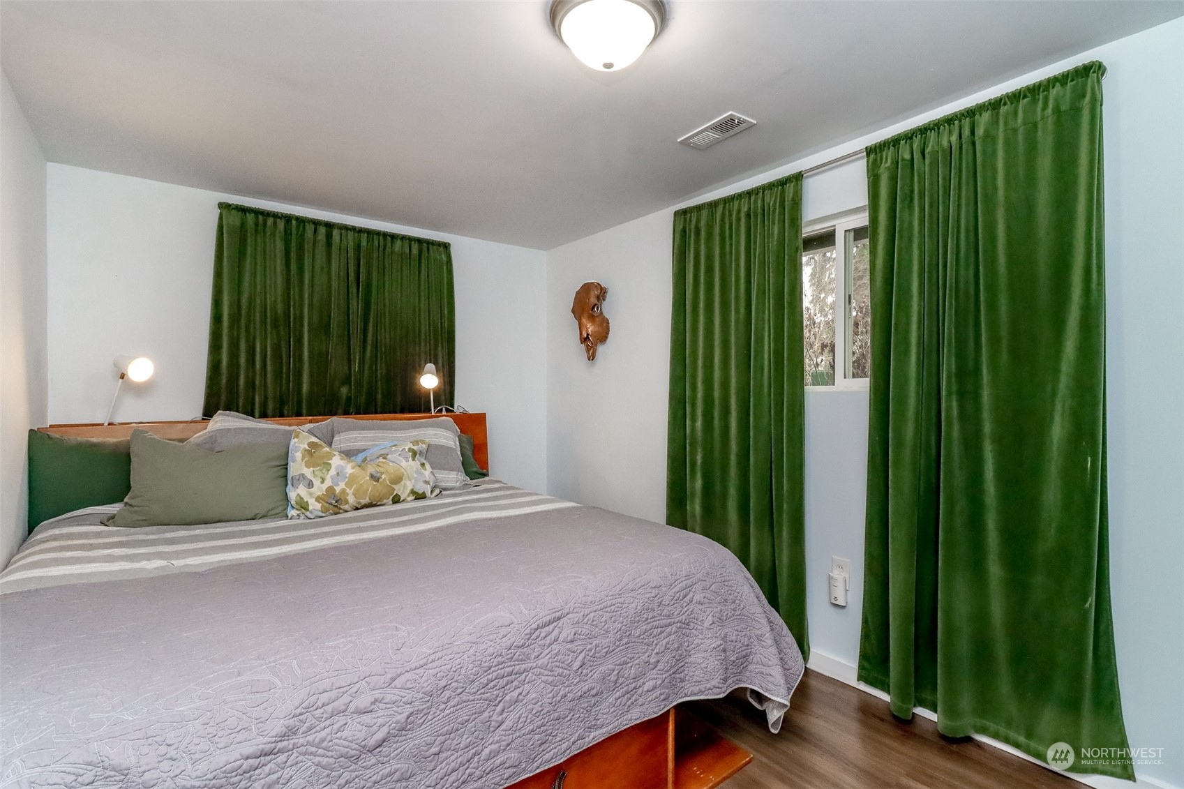 3903 Freeman Road East Edgewood, WA 98371 - Photo 22 of 40 a bedroom with a large bed and a window