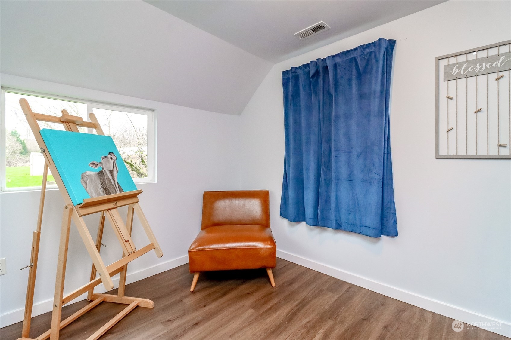 3903 Freeman Road East Edgewood, WA 98371 - Photo 24 of 40 a room with wooden furniture wooden floor and windows