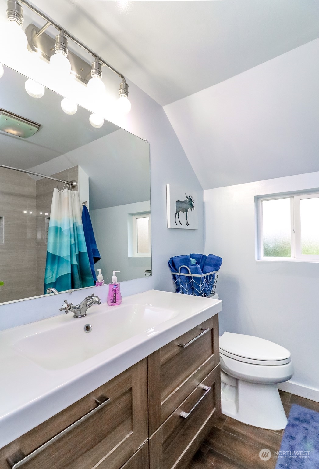 3903 Freeman Road East Edgewood, WA 98371 - Photo 26 of 40 a bathroom with a sink and a mirror