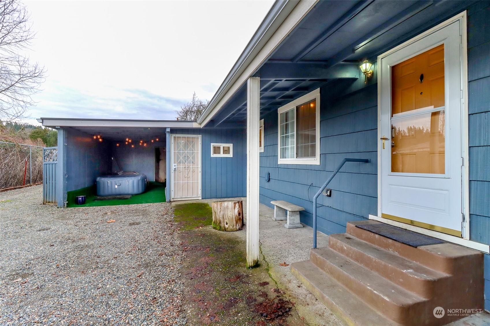 3903 Freeman Road East Edgewood, WA 98371 - Photo 3 of 40 a front view of a house with garden