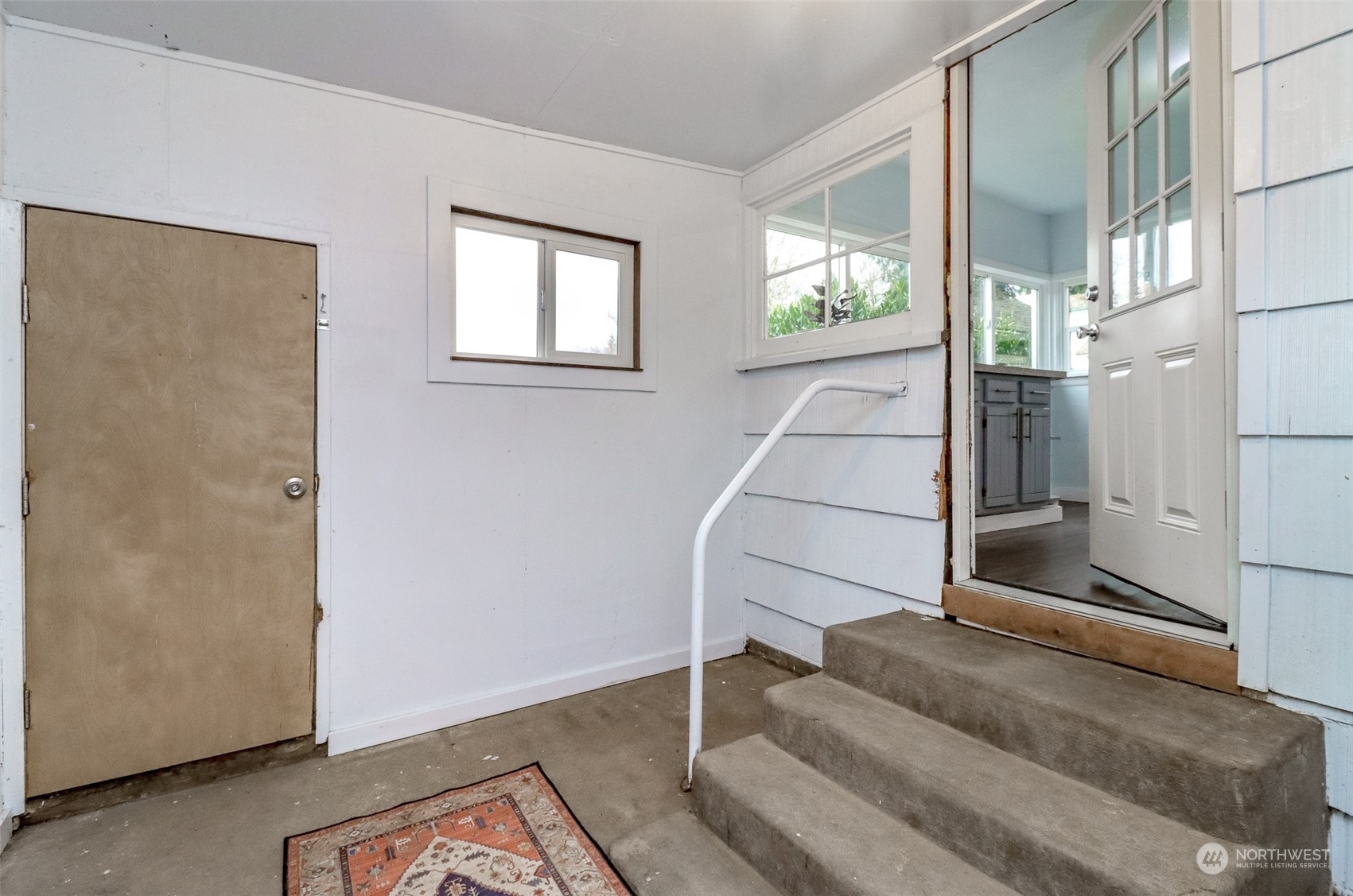 3903 Freeman Road East Edgewood, WA 98371 - Photo 31 of 40 a view of entryway and hall with wooden floor