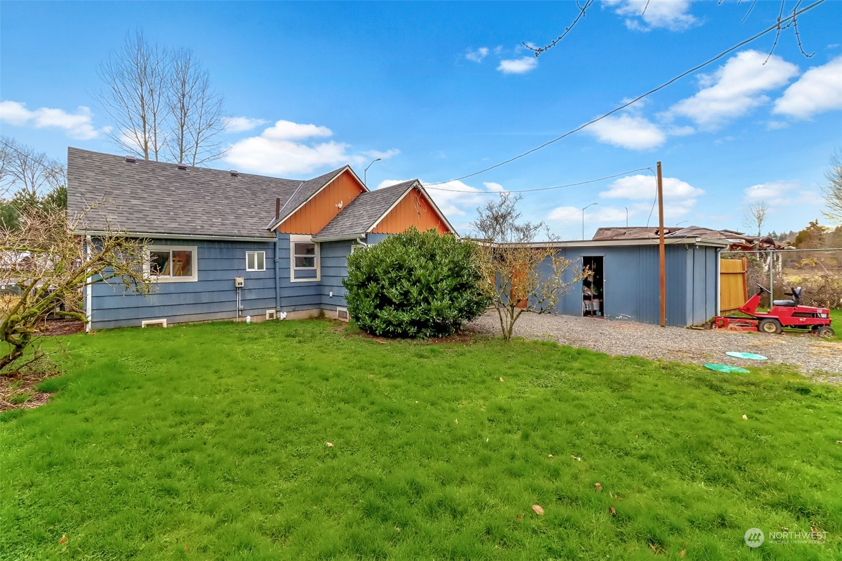 3903 Freeman Road East Edgewood, WA 98371 - Photo 33 of 40 a front view of a house with a yard