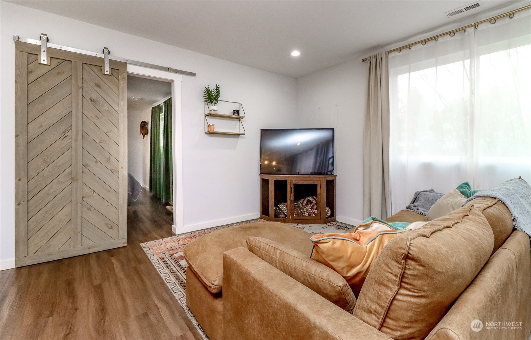 3903 Freeman Road East Edgewood, WA 98371 - Photo 6 of 40 a bedroom with a bed and a window