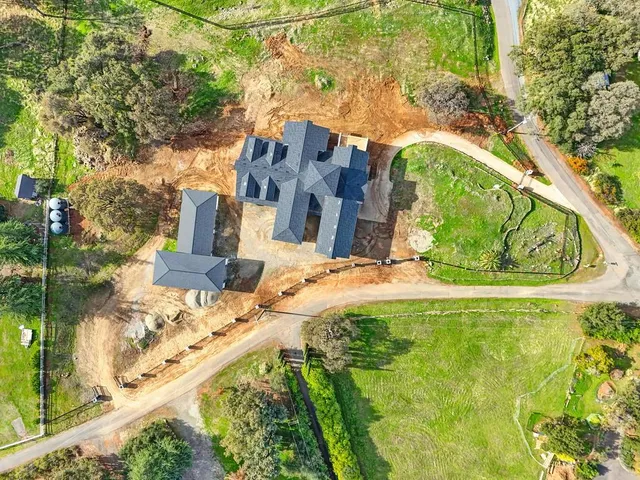 a view of a garden with a lake