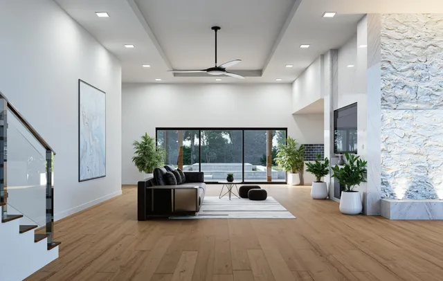 a living room with furniture fireplace and potted plants