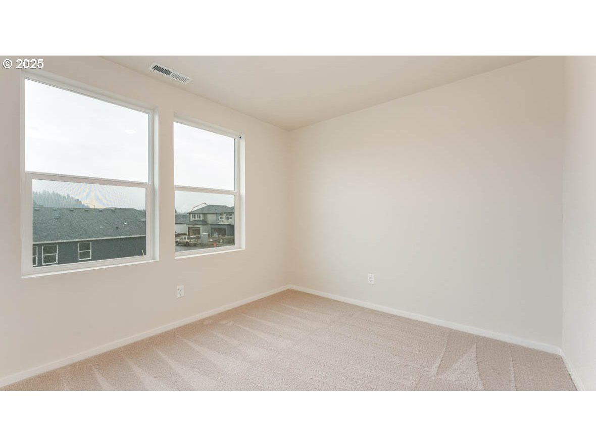 2975 T Street Springfield, OR 97477 - Photo 13 of 28 a open living room with a window