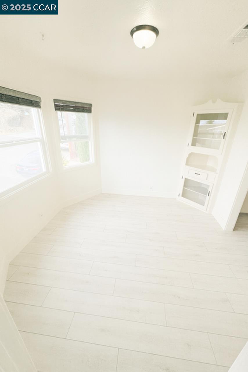 211 Second Street, Unit TOP Rodeo, CA 94572 - Photo 7 of 12 a picture of a room