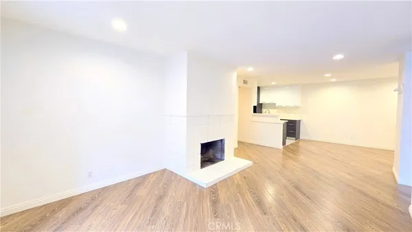 a living room with a couch and a flat screen tv